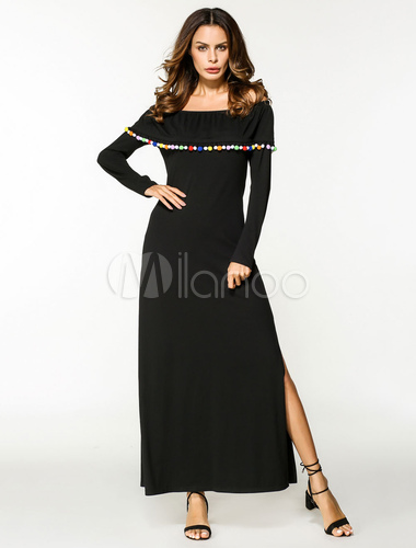 black dress with pom poms