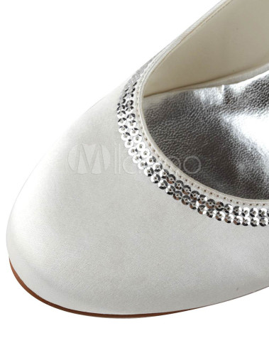 white heels with bow on back