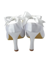 white heels with a bow