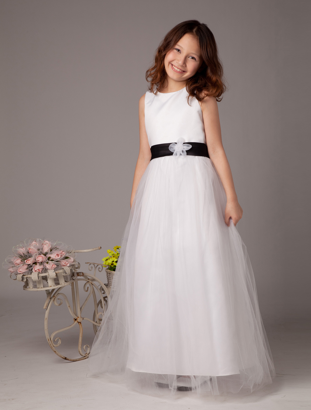 white flower girl dress with gold sash