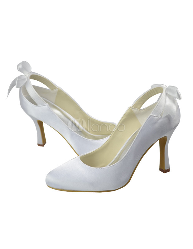 white heels with a bow
