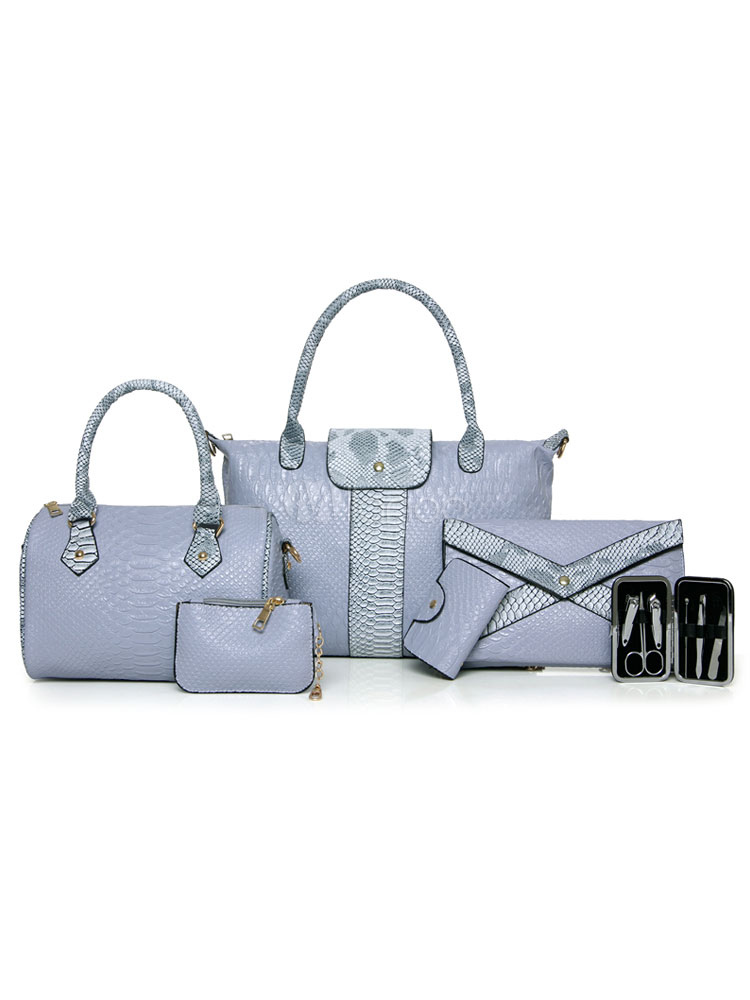 blue illusion handbags