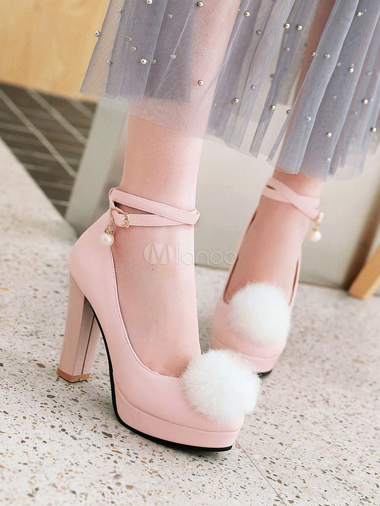 heels with pom poms on them