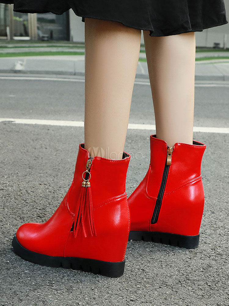 long boots with wedge heels