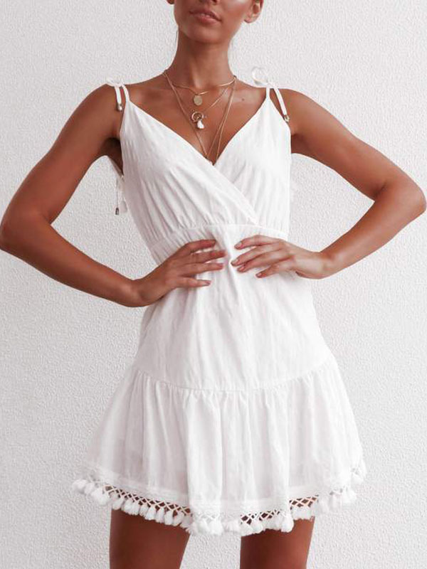 white dress with tassels