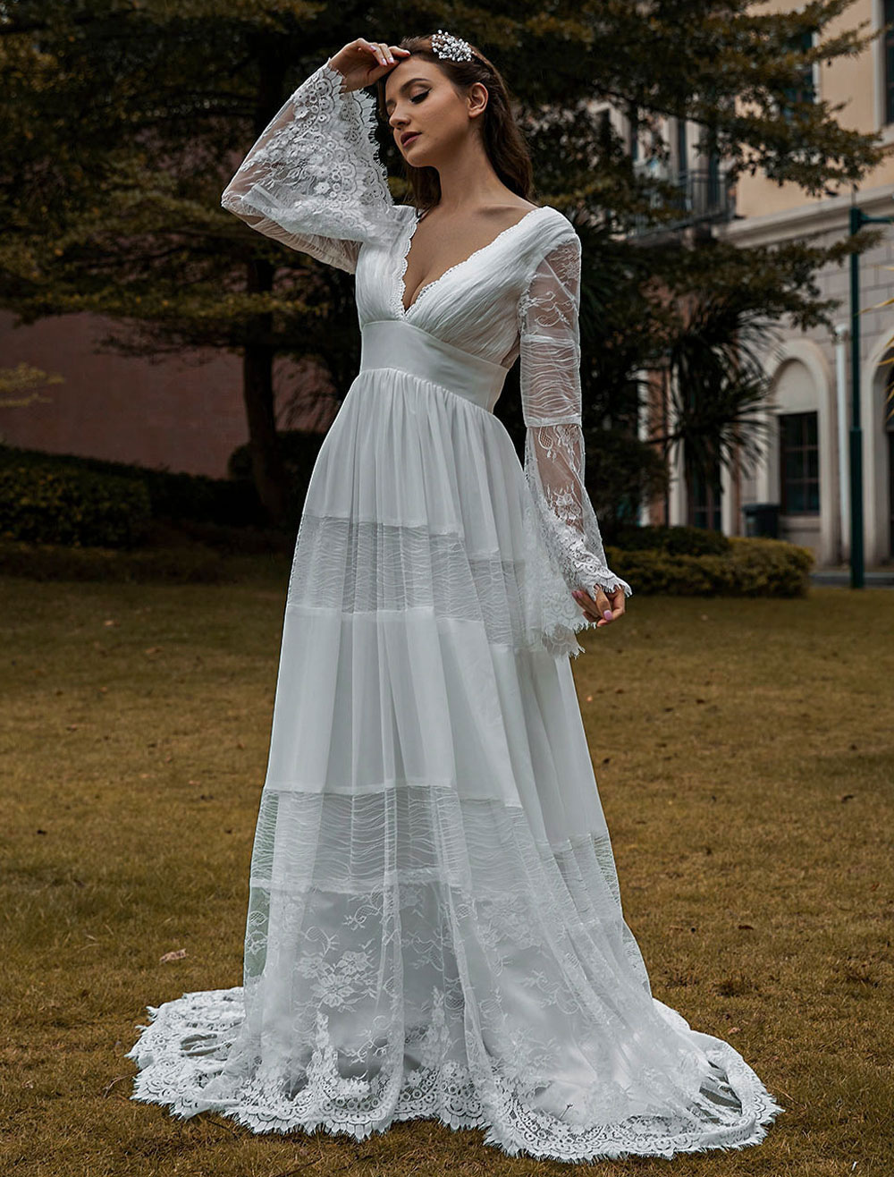 Robe de mariée bohème col V manche longue dos nu à traîne