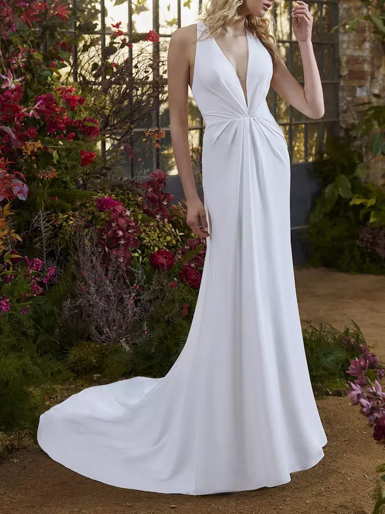 beach wedding dresses the knot HONOR bride Maddie tied the knot in the sunshine on a California beach in the custom white silk organza gown with hand embroidered shirred satin ribbon. #honornyc