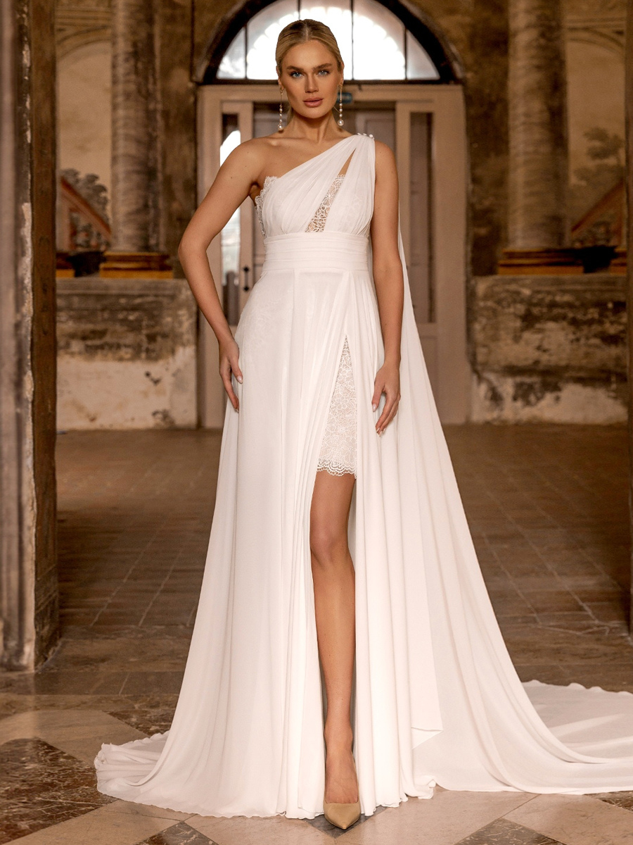 Robe de mariée bohème en mousseline de soie et dentelle deux pièces avec traîne taille naturelle fermeture éclair sans manches décolleté design ivoire