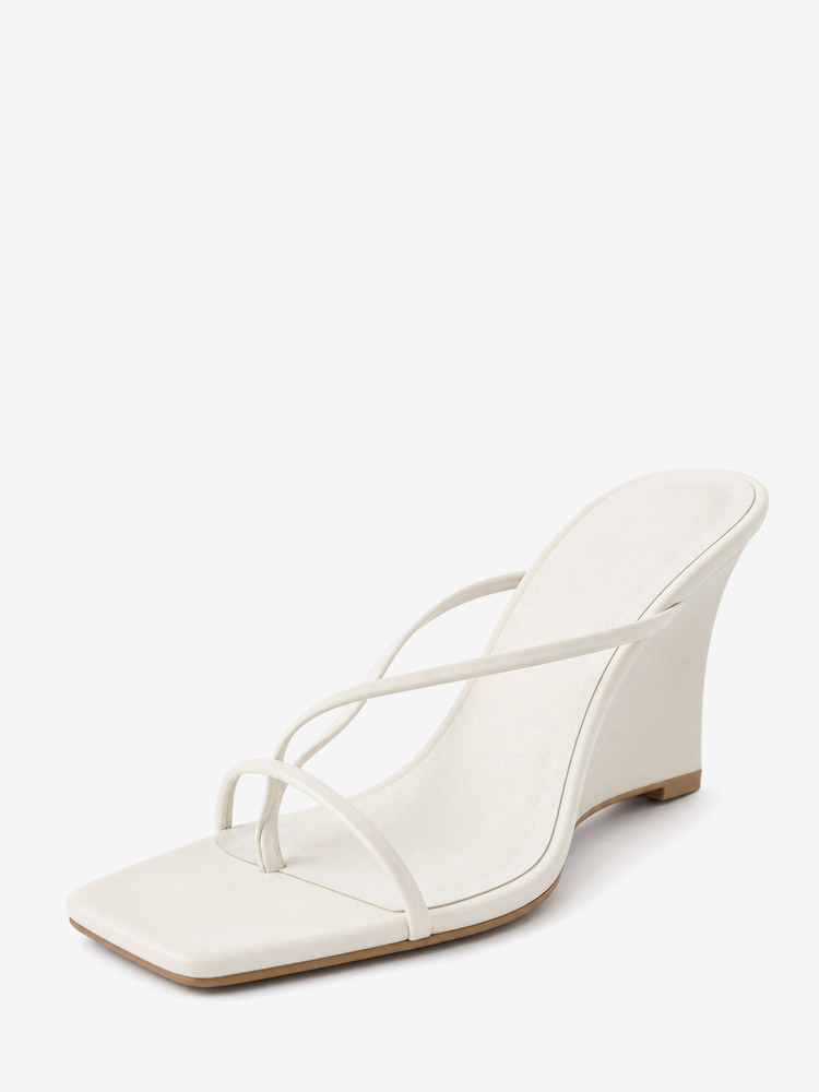 Sandales compensées blanches à bride entre les orteils et sans talon pour femmes