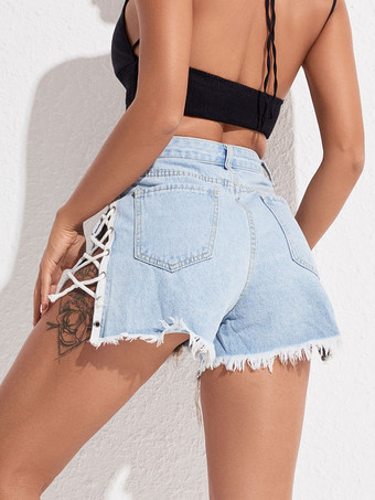 女性のジーンズのセクシーなボタンの底