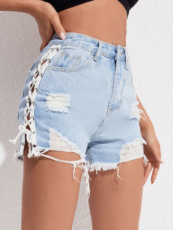 女性のジーンズのセクシーなボタンの底