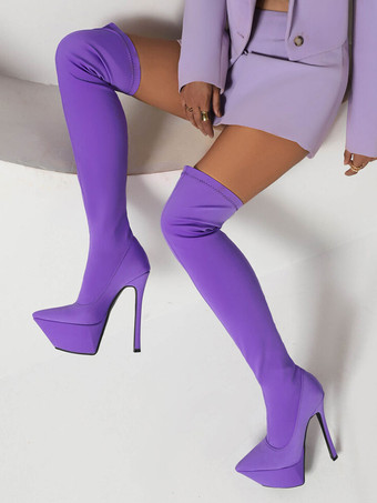 女性の太もものハイブーツ尖ったつま先のスティレットヒール膝のブーツの上に伸縮性