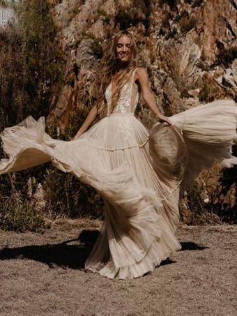 Vestidos de novia Boho Una línea de cuello en V profundo Hasta el suelo Encaje sin mangas Vestidos de novia sin espalda
