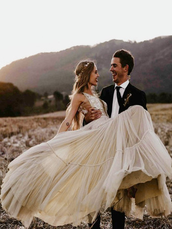 Vestidos de novia Boho Una línea de cuello en V profundo Hasta el suelo Encaje sin mangas Vestidos de novia sin espalda