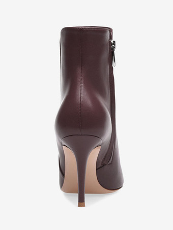 女性の足首のブーツはつま先のスティレットヒールブーツを尖らせました