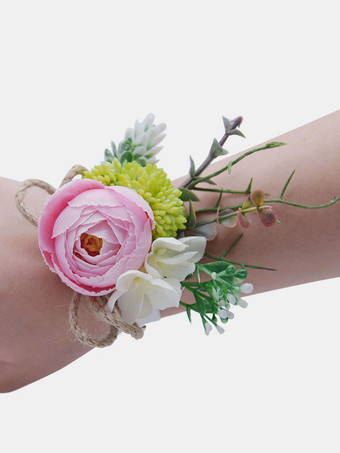 ピンク花嫁介添人の結婚式の手首の花