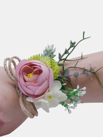 サーモンピンク花嫁介添人の結婚式の手首の花