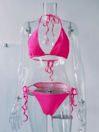 女性のツーピースの水着ピンクのストラップの首の夏のセクシーな水着