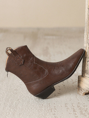 Botas vaqueras negras con punta puntiaguda y botines planos