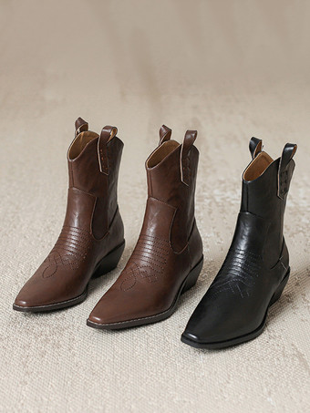 Botas vaqueras negras con punta puntiaguda y botines planos