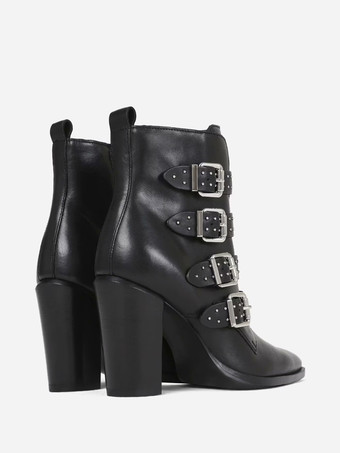 Botines negros con hebilla y punta puntiaguda y tacón de cachorro para mujer