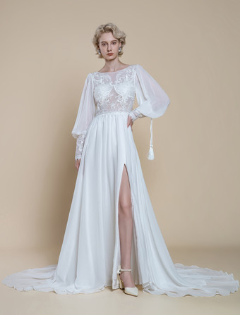 ボヘミアンウェディングドレス レース カットアウト Aライン トレーン付き ナチュラルウエスト バックレス ロングスリーブ ジュエルネック アイボリー