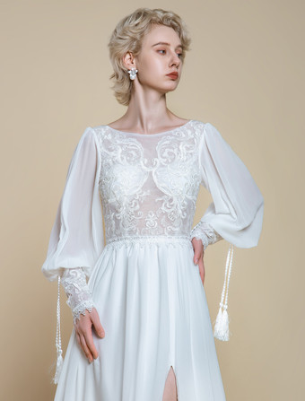 ボヘミアンウェディングドレス レース カットアウト Aライン トレーン付き ナチュラルウエスト バックレス ロングスリーブ ジュエルネック アイボリー