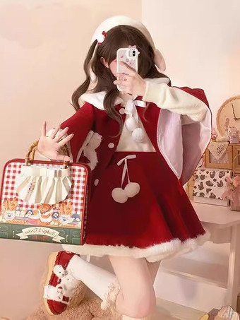 Atuendos dulces de Lolita: capa falda sin mangas y lazos rojos