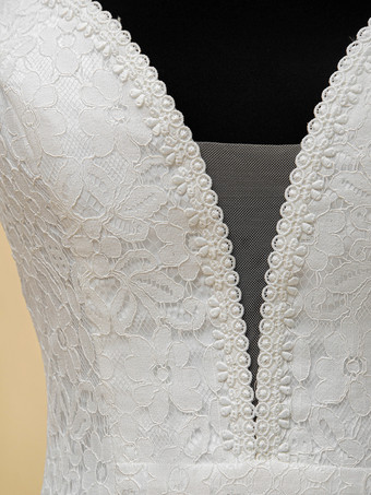 ボヘミアンウェディングドレス レースフリンジシース トレーン付き ナチュラルウエストジッパー ノースリーブ Vネック アイボリー