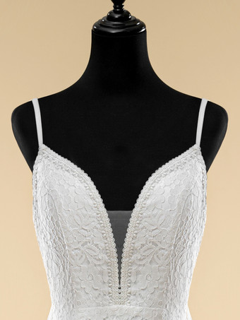 ボヘミアンウェディングドレス レースフリンジシース トレーン付き ナチュラルウエストジッパー ノースリーブ Vネック アイボリー