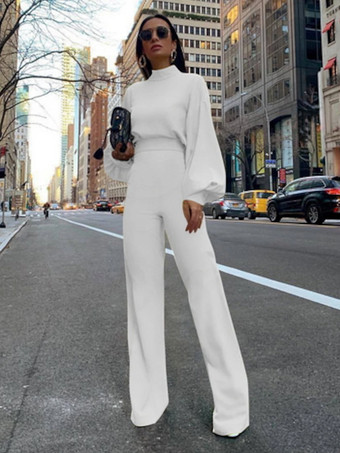 ホワイト 黒のジャンプスーツハイカラー長袖ボタン不規則なポリエステルフレア夏ワンピース衣装