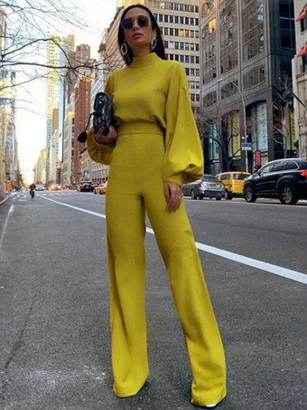 イエロー黒のジャンプスーツハイカラー長袖ボタン不規則なポリエステルフレア夏ワンピース衣装