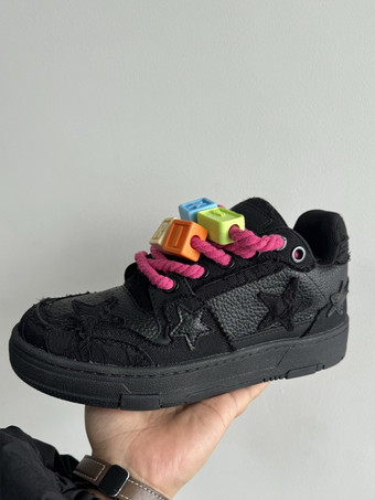 Zapatillas de skate negras con punta redonda y cordones para mujer