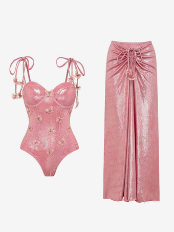 蝶の装飾が施されたピンクのワンピース水着とプリーツマキシスカートのセット 2025年夏