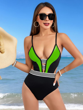 グリーン カットアウトが施された白黒コントラストのワンピース水着 2025