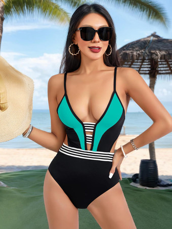 シアンカットアウトが施された白黒コントラストのワンピース水着 2025