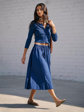 Conjunto bohemio de dos piezas con top corto de manga larga y falda larga 2025