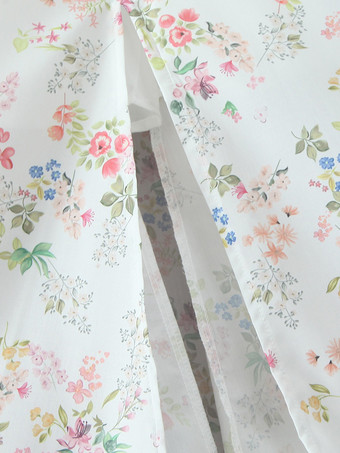 ハートネックとハイスリットが特徴的な花柄ミディドレス 2025