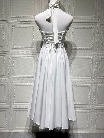 ソフトピンクのホルターネックAラインミディ丈パーティードレス（レディース）2025