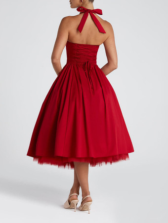 ソフトピンクのホルターネックAラインミディ丈パーティードレス（レディース）2025