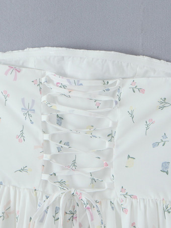 レースの裾とレースアップバックが特徴的な花柄ストラップレスミニドレス 2025