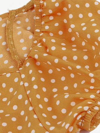 パフスリーブとフロントタイが付いた水玉模様のミディ丈ヴィンテージドレス 2025