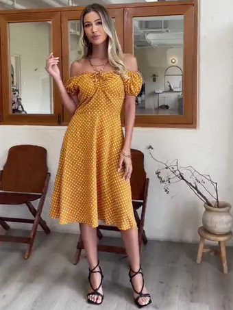 パフスリーブとフロントタイが付いた水玉模様のミディ丈ヴィンテージドレス 2025