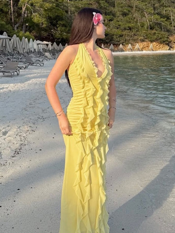 2025年夏のイベントにぴったりのバターイエローのホルターネックフリルマキシドレス
