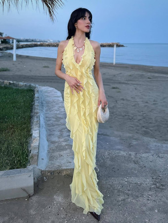 2025年夏のイベントにぴったりのバターイエローのホルターネックフリルマキシドレス