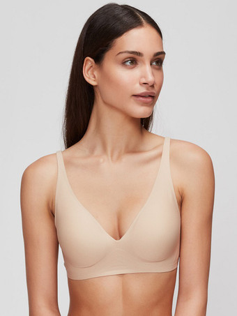 ライト アプリコットシームレスブラジャー 効果を最小限に抑える スリミング下着 深いVネック ワイヤレス 圧縮サポート 薄型 ソフトサポート 快適 ライト アプリコット ポリエステル ランジェリー