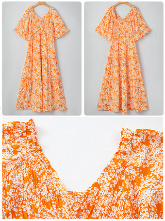 2025年夏にぴったりの、Vネックとハイウエストのオレンジのボヘミアンフローラルマキシドレス