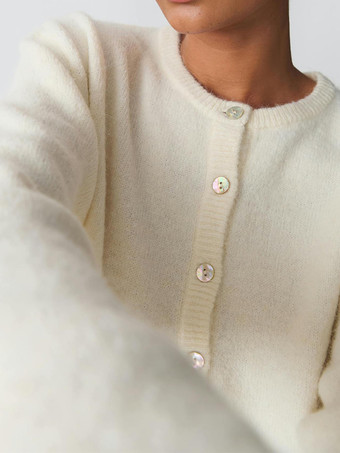 Cárdigan básico de punto con cuello redondo para mujer 2025