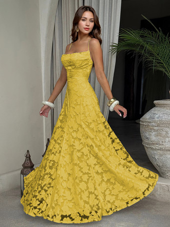 イエロー2025年夏のイベントにぴったりの、バックレスデザインのジャカードマキシスリップドレス