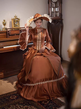 ブラウンのバスル ビクトリアンドレス ロングフレアスリーブ ボールレトロドレス 帽子付き